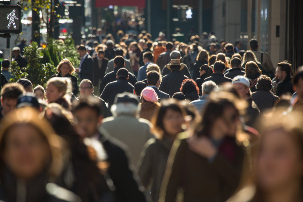 People Walking in Crowded City Life in 100 Years