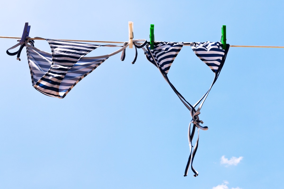 striped bikini on clothing line outdoors