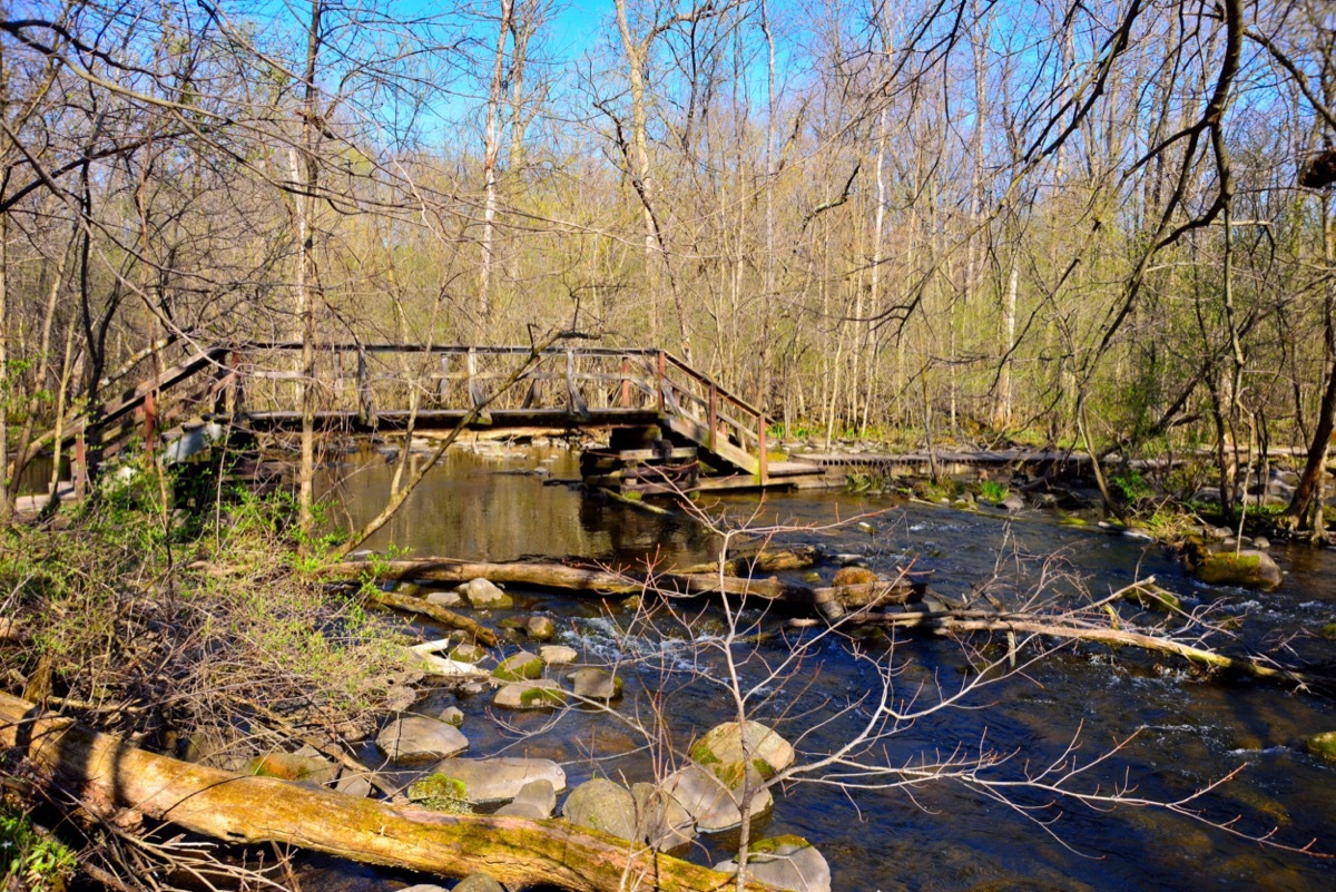 a wooden bridge goes over a river near Merton, Wisconsin