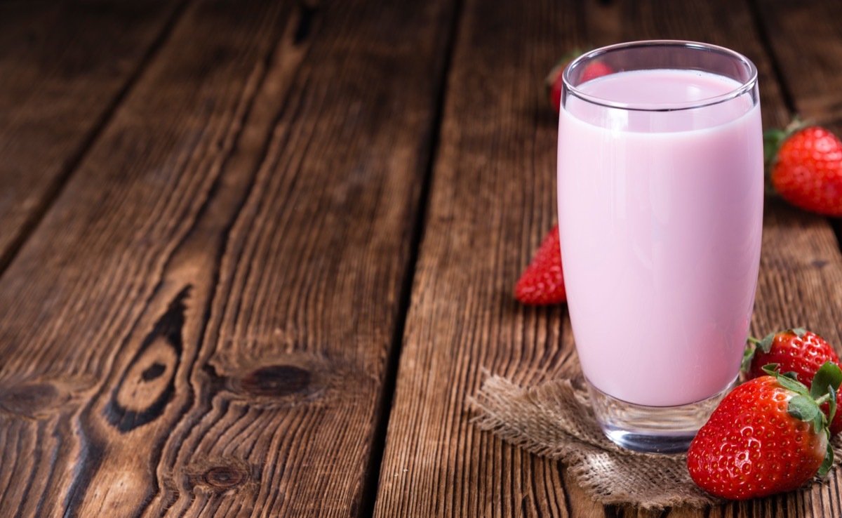 strawberry milk on wooden table