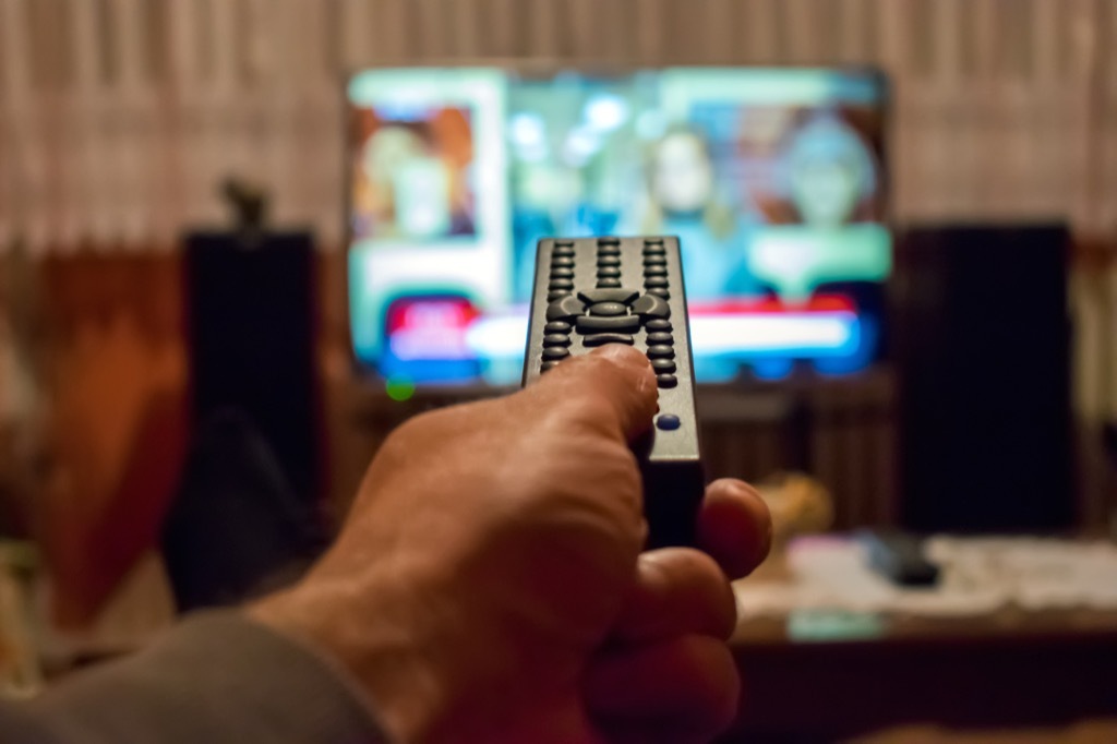 Man Using the Remote on the Television Weight Loss Advice