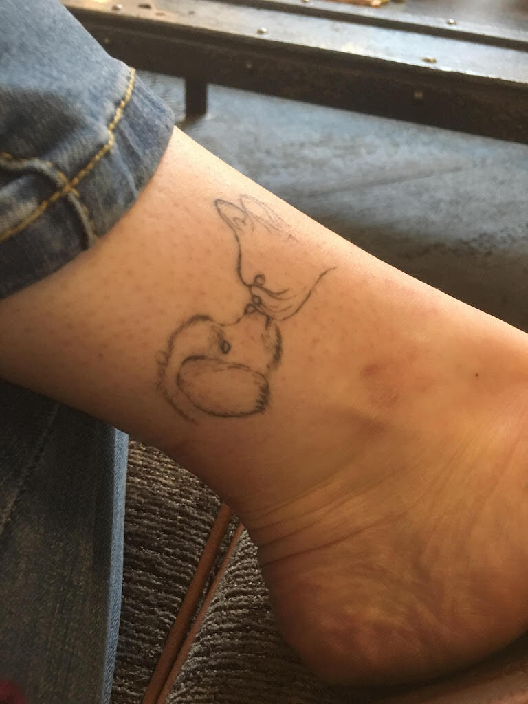 Morgan's dogs tattoo