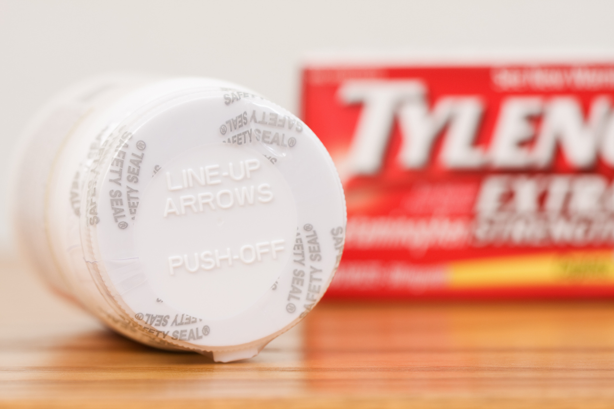 Container and box of Tylenol. 