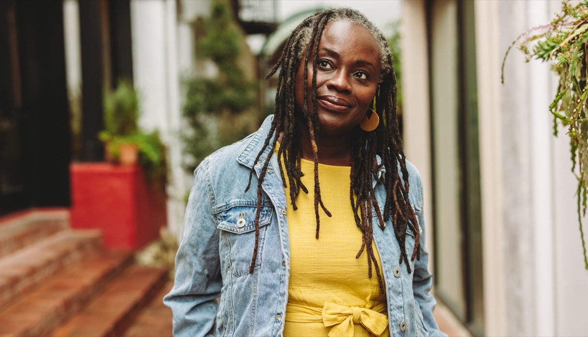 fashionable older woman in denim jacket