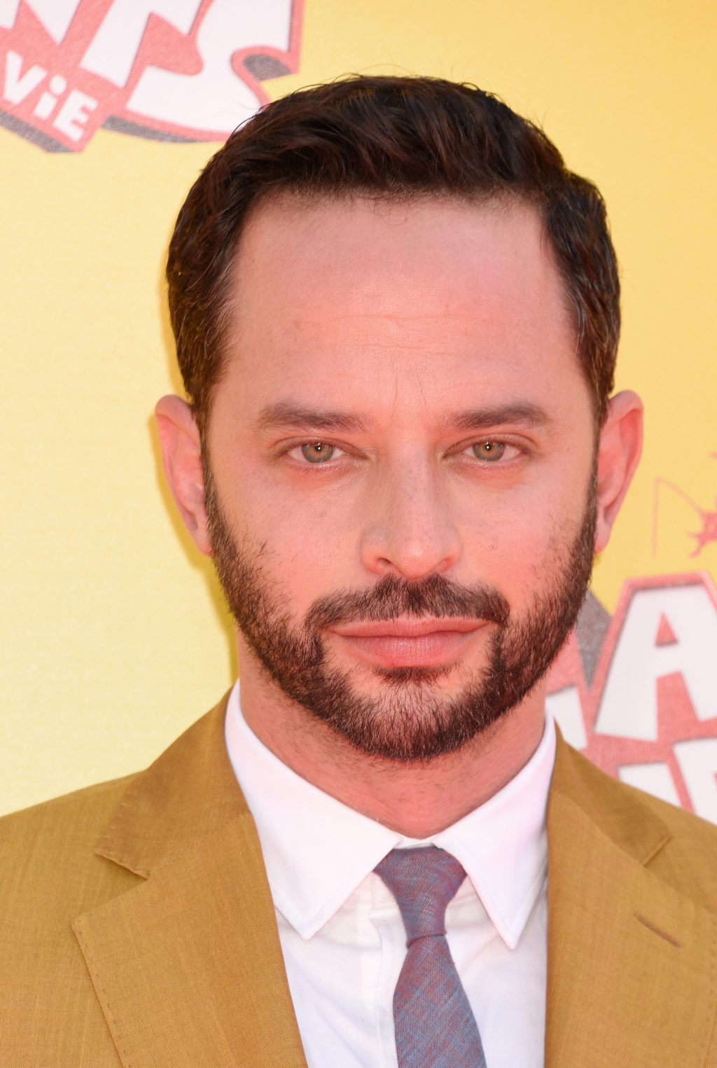 Nick Kroll in a suit