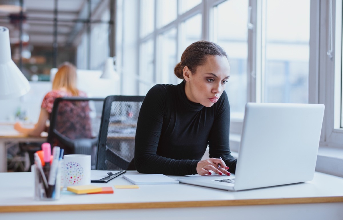 woman working on computer, office etiquette