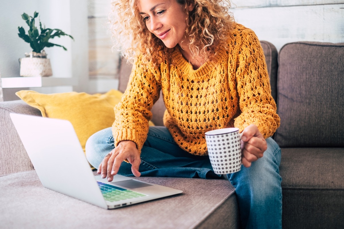 Woman typing on laptop