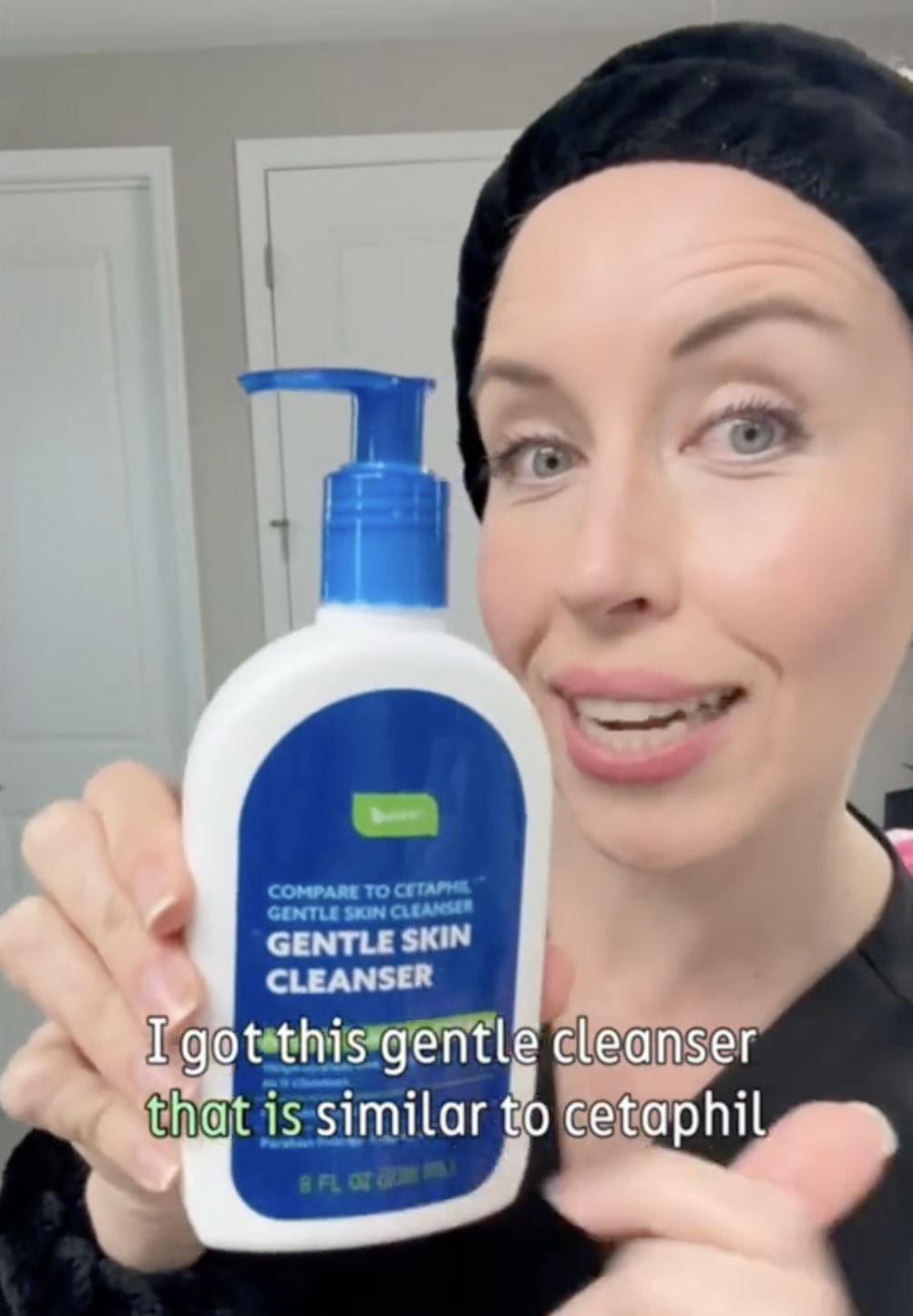 Dermatologist Maren Locke holds up a skincare product from Dollar Tree