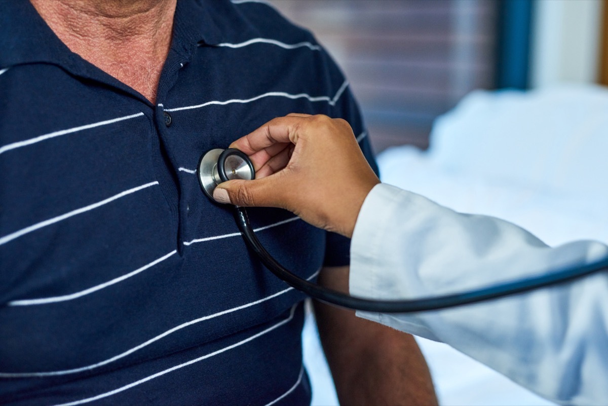 Closeup shot of a doctor examining a patient with a stethoscope