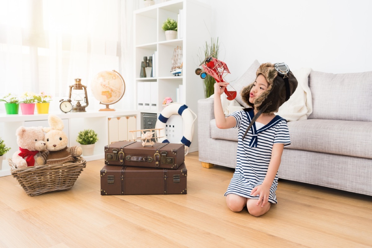 kid in playroom with antiques, joanna gaines tips