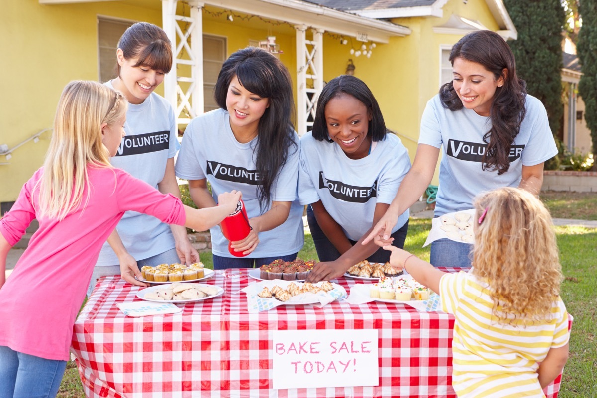 Women holding a bake sale for a fundraiser