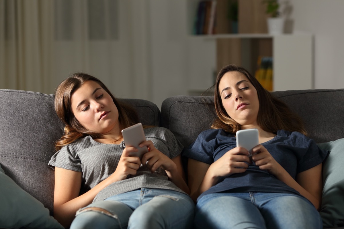 Two Bored Women on Their Phoned