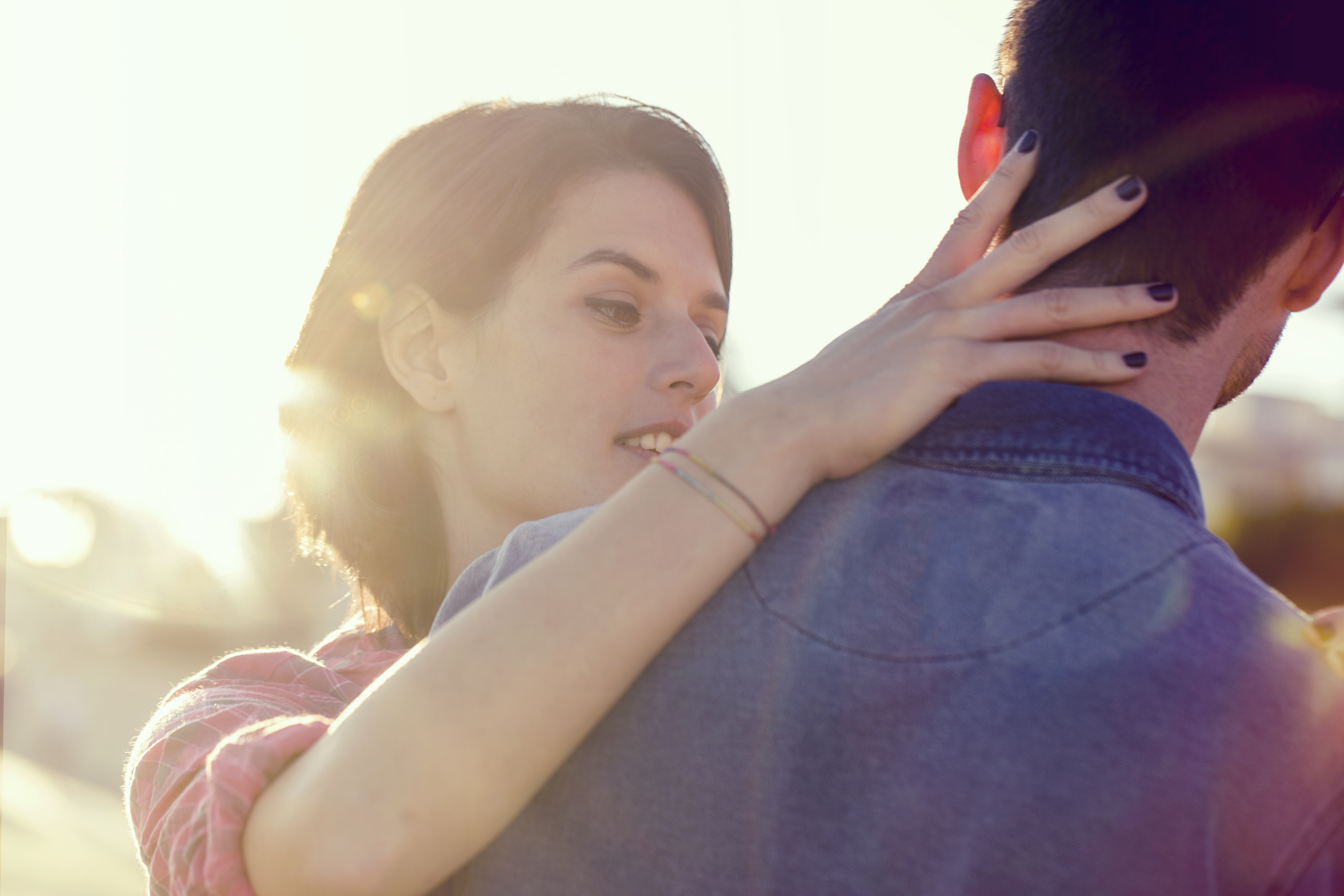 woman with her hand on man's head, what he wants you to say