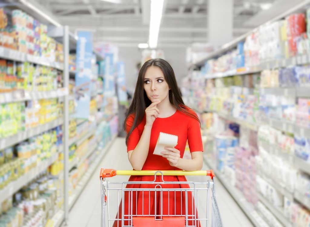 woman grocery shopping aisle