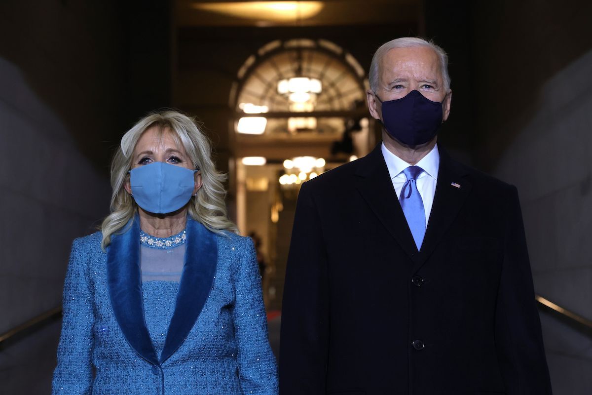 President-elect Joe Biden (R) and incoming US First Lady Jill Biden arrive for his inauguration as the 46th US President, on the West Front of the US Capitol in Washington, DC on January 20, 2021