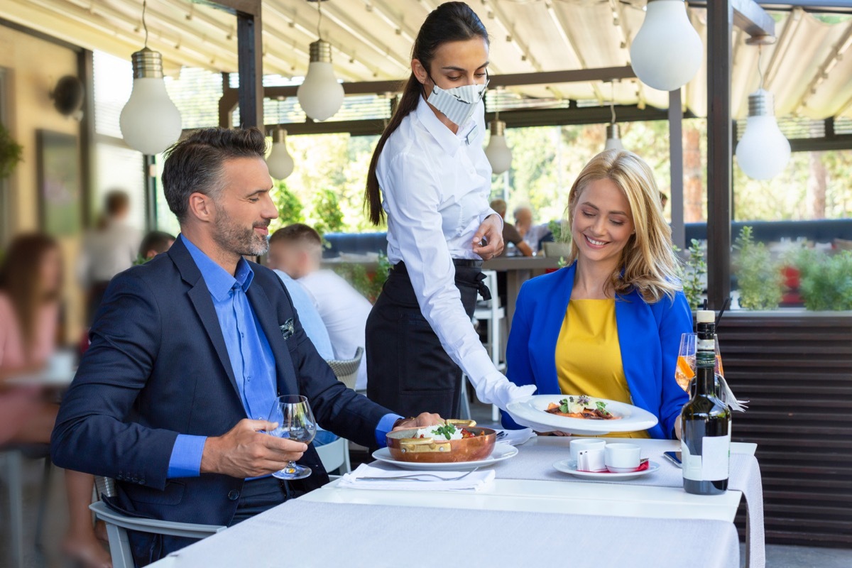 couple dining indoors during Covid pandemic