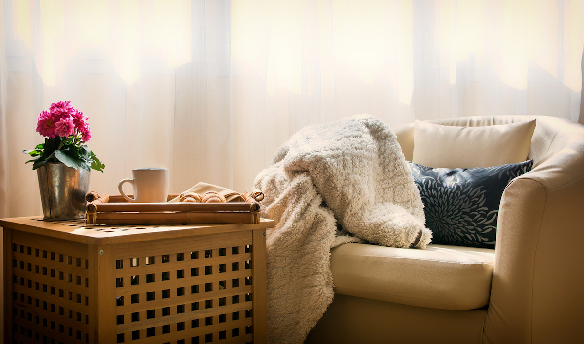 cozy chair and a wooden end table