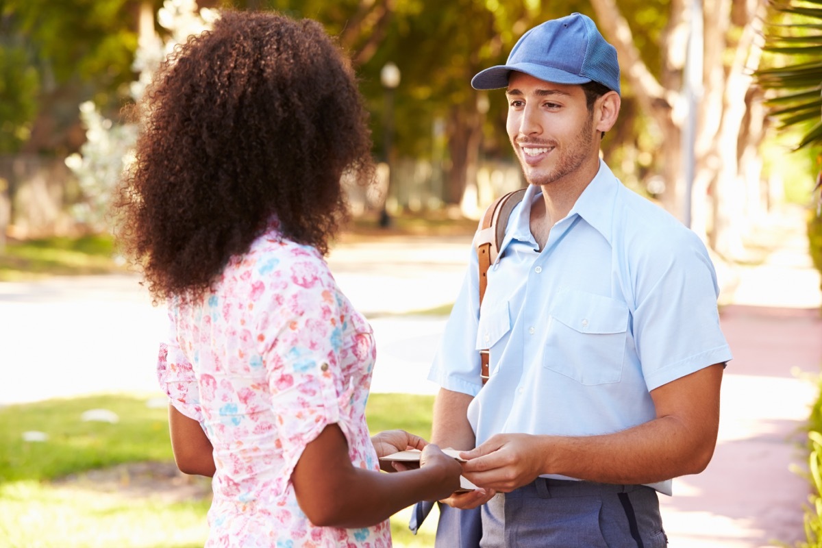 Mailman and woman talking