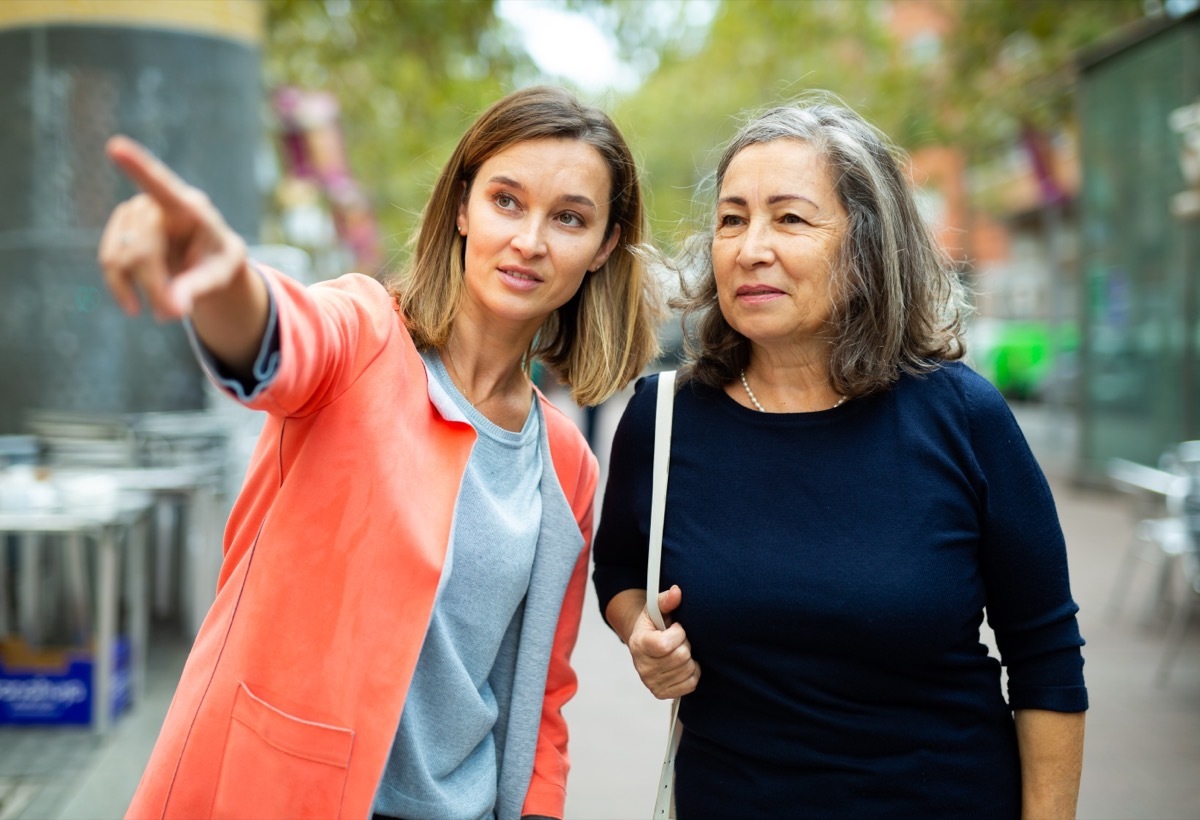 polite woman giving directions