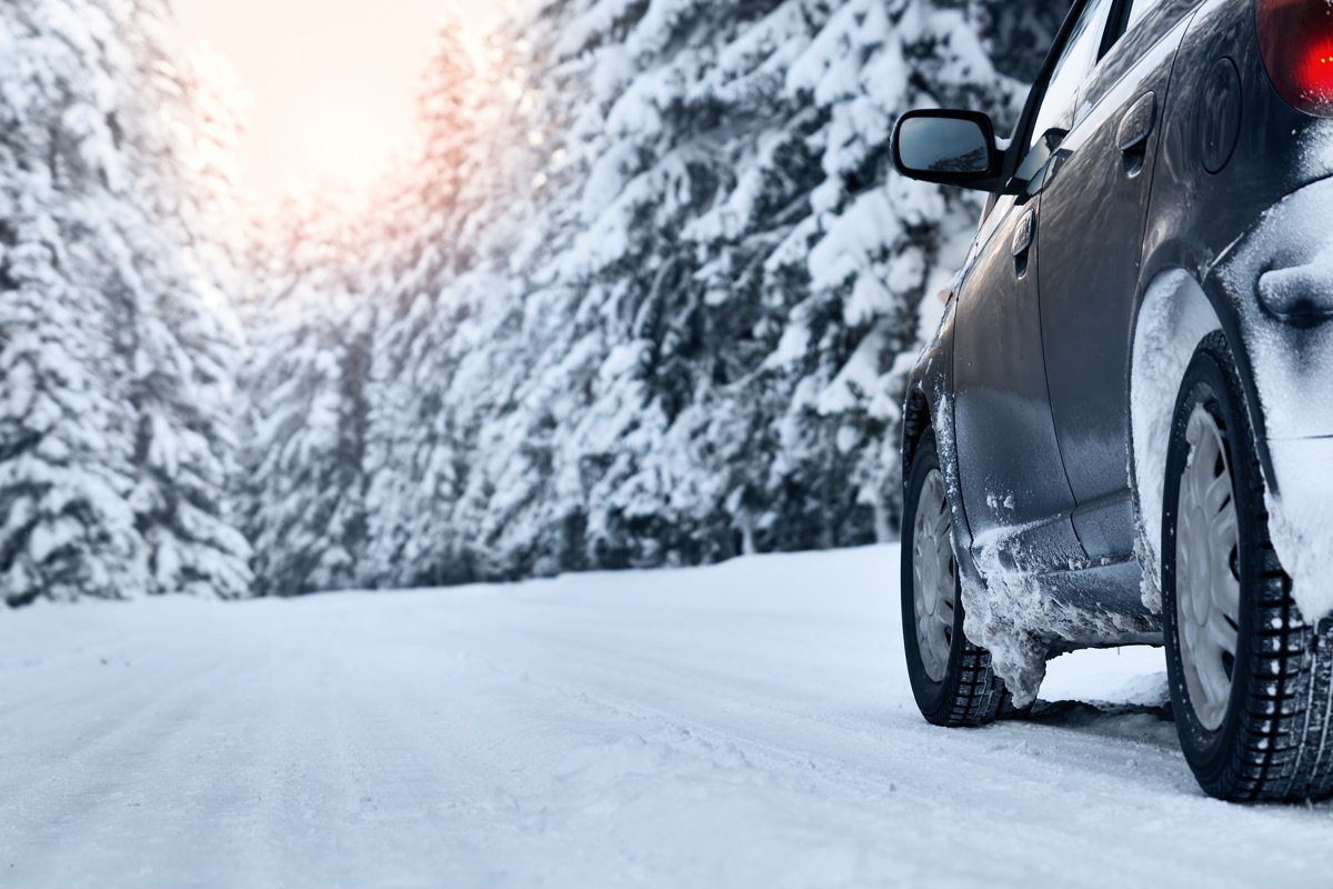 car on winter road in the morning