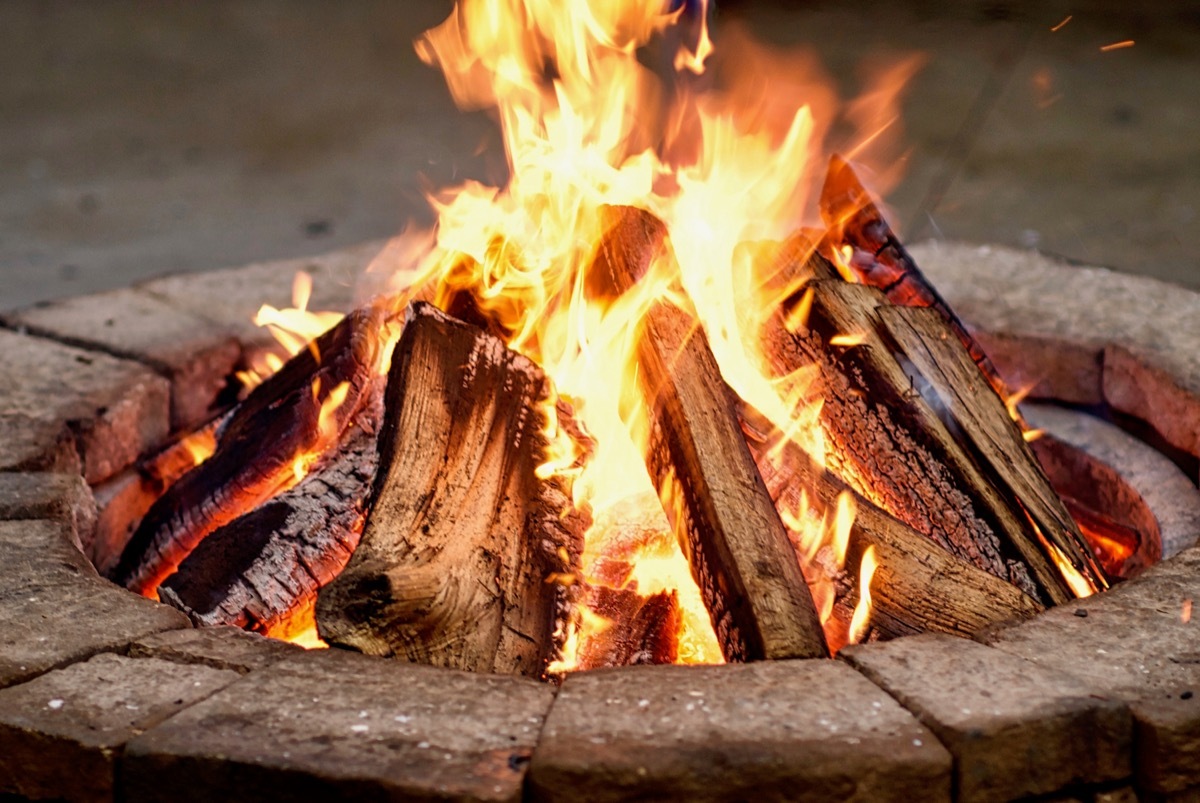 fire pit in the backyard of a home, fall home upgrades