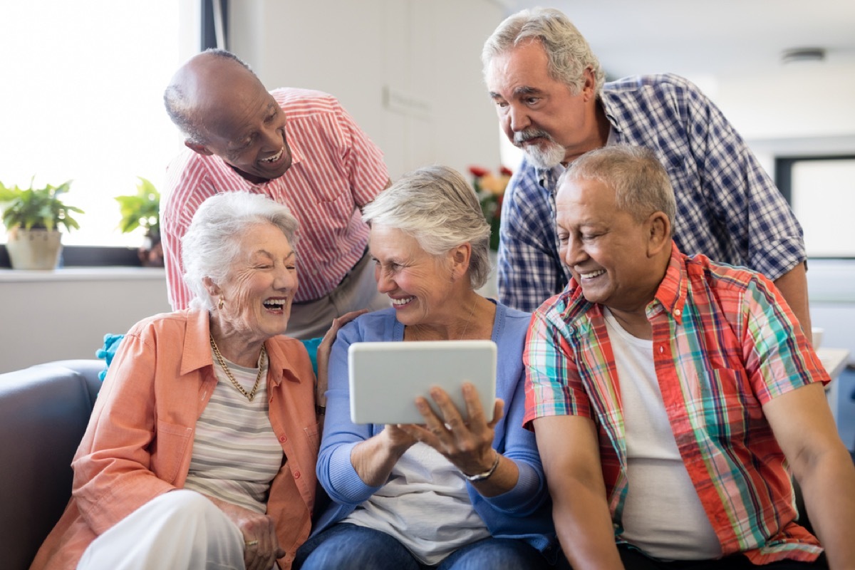 seniors watching tablet, empty nest