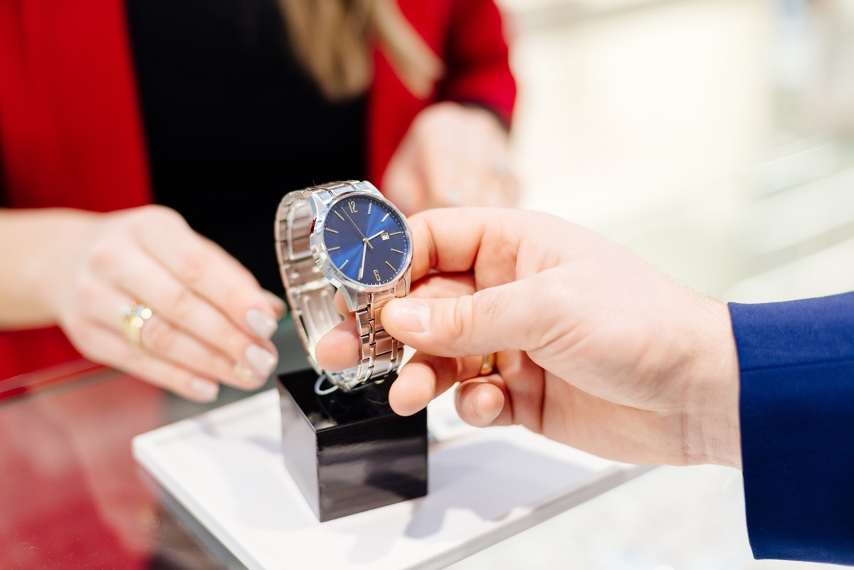 Man at the jewelry store buying a watch