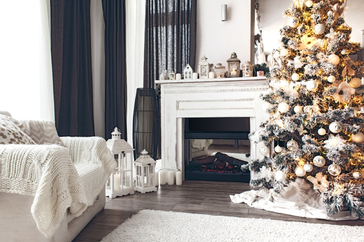 a christmas tree in a white living room christmas tree decorating tips