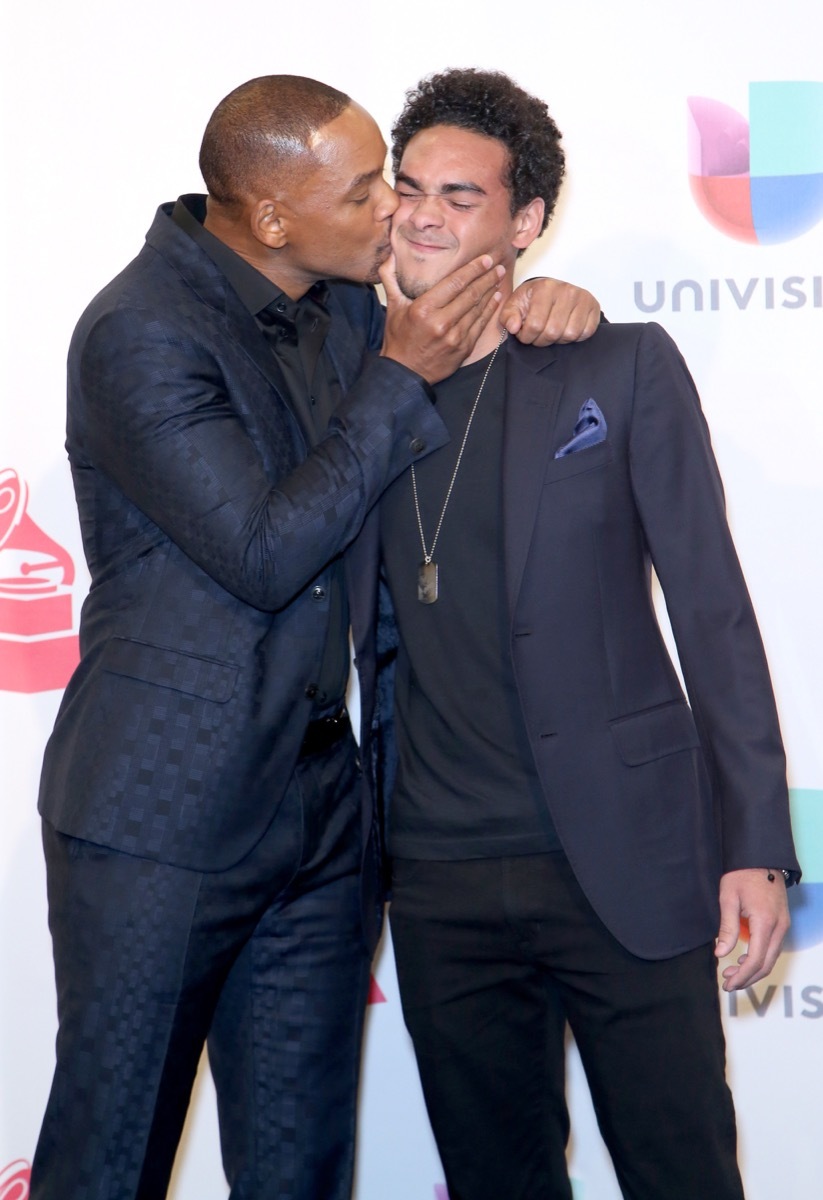 Will Smith kissing son Trey Smith's cheek