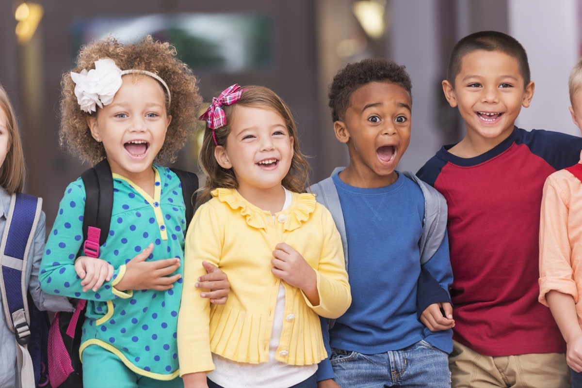 group of little children laughing at funny knock knock jokes for kids