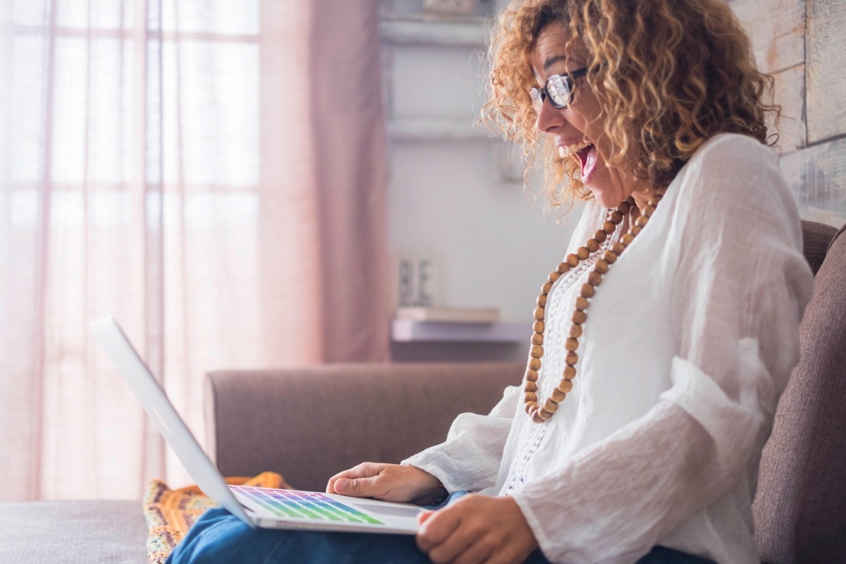 woman reading a computer