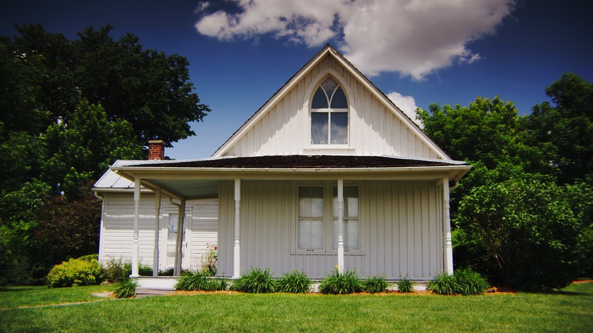 american gothic farm house in the summer