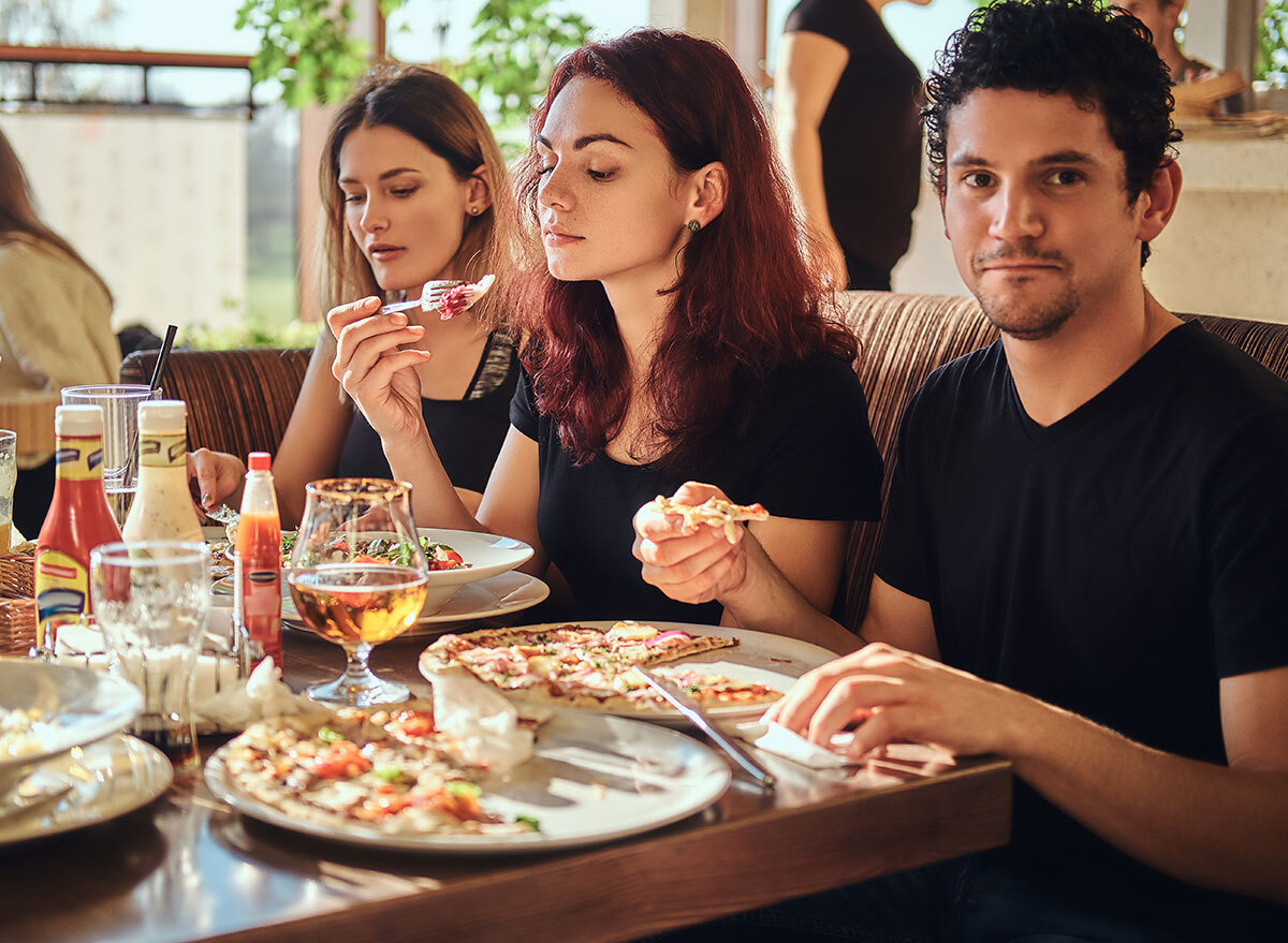 friends eating at italian restaurant