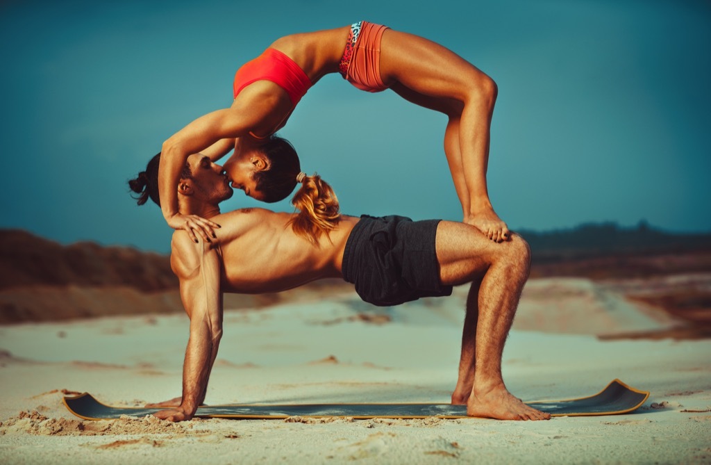 couple doing yoga, date night ideas