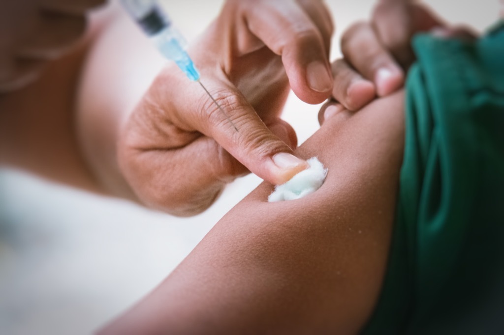 Kid at the Doctor's Office Getting a Smallpox Vaccine