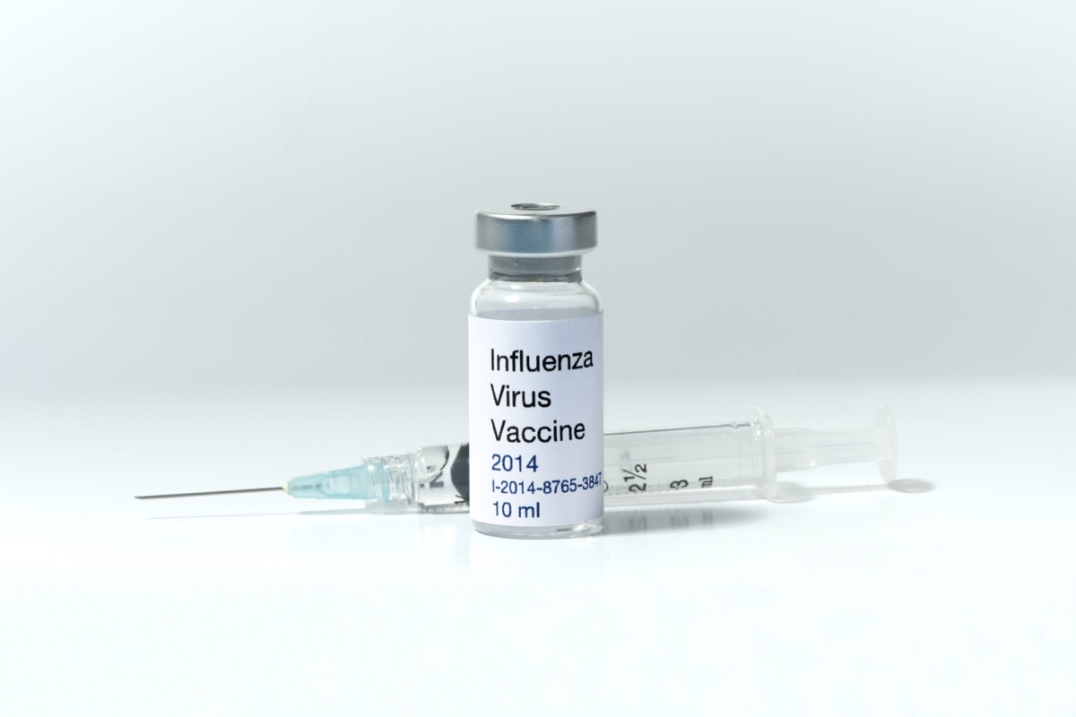 Influenza vaccine vial with syringe